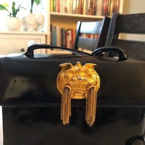 Vintage Judith Leiber patent leather handbag.